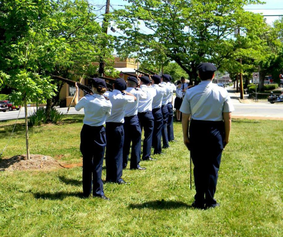 Line of servicemembers standing at attention