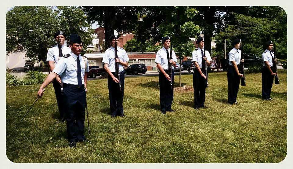 Cadets with firearms, at attention